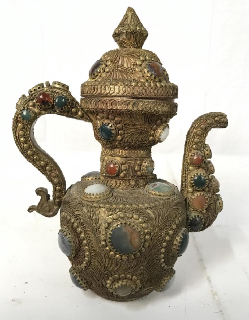 Polished Stone Encrusted Brass Tea Pot: Essex, ceremonial. Possibly far eastern, ornate brass work encrusted with cabochon polished stones, lid attached w chain, vase, Vessel, decorative accessory, measures ht 10.5 inches handle to spout wi