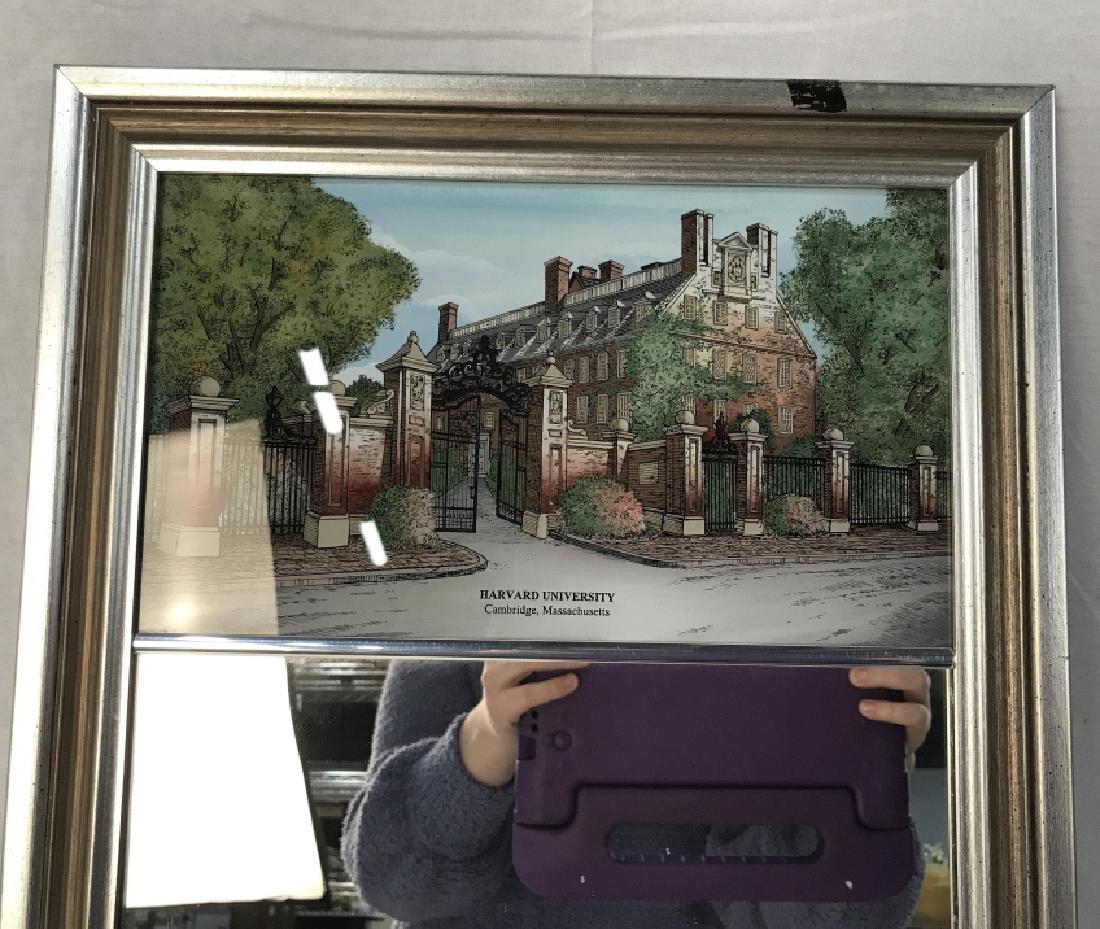 Eglomise Mirror with Harvard University Panel: Hand painted Eglomise mirror with Harvard University reverse painted panel. Verso has information from Eglomise Designs, Inc. Mirror is part of the University Series. Mirror has silver tone wood frame