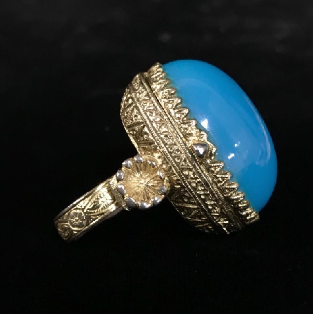 Poison Pill Lidded Cocktail Ring Jewelry: Oversized aqua tone cabochon center hinged lid opens to poison pill compartment, gold toned setting, box measures app 1.5 by 1 inch, vintage jewelry, estate jewelry,