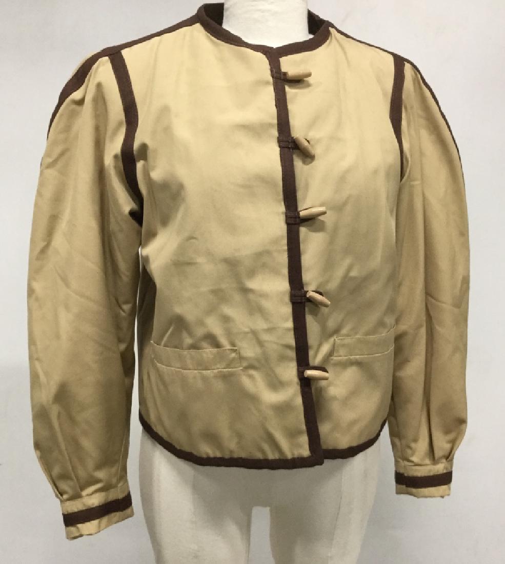 YVES SAINT LAURENT Fur Lined Bomber Jacket: YVES SAINT LAURENT Luxury Designer rabbit fur lined women’s bomber jacket. Deep brown tone rabbit fur interior lining. Circa 1970. Toggle front closure. Label reads for Yves Saint Laurent, Size 40. 