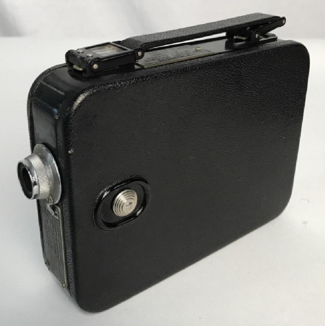 Vintage Cine Kodak Eight Model 20: Vintage Kodak Cine Eight model 20 vintage collectible camera. A 35mm vintage movie camera produced in the 1930’s. A compact heavy metal camera. Looks to be in nice clean condition, not tested, comes