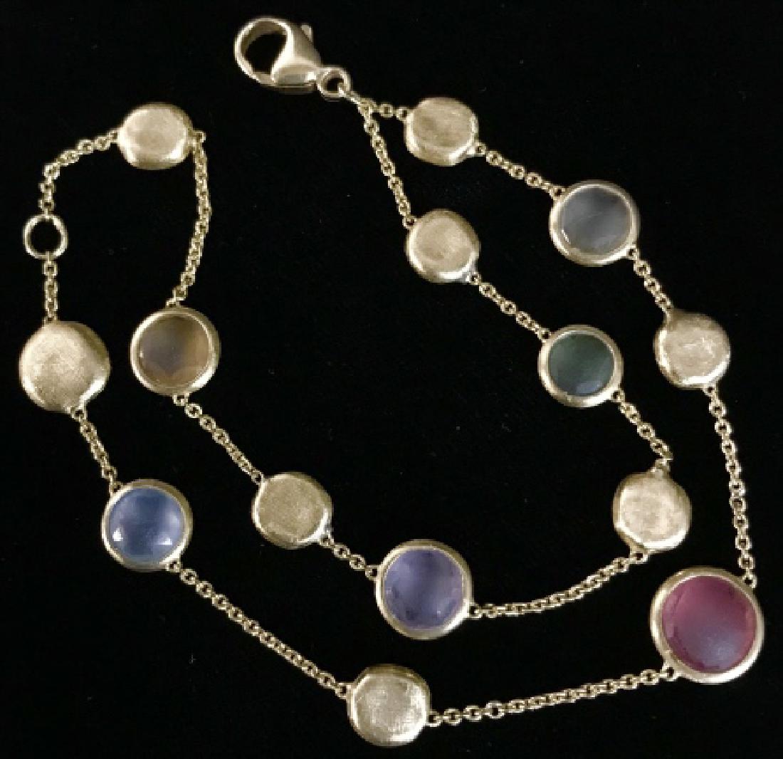 NAGI Gold Toned And Colored Stone Glass Bracelet: NAGI Gold Toned And Colored Stone Glass Bracelet with gold toned metal chain link and lobster claw clasp, colored glass stone test positive on jewelry tester, measures approximately 6.75 inches long. 