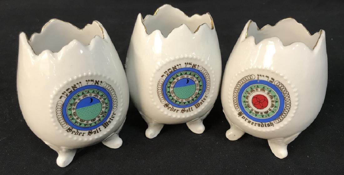 set of 3 Porcelain Seder Cups: set of 3 Porcelain Seder Cups, each shaped as an egg with feet and broken edges to resemble egg, 2 labeled Seder Salt Water and 1 Horseradish, With Hebrew lettering, Judaica, Hebrew Lettering, Sederwa