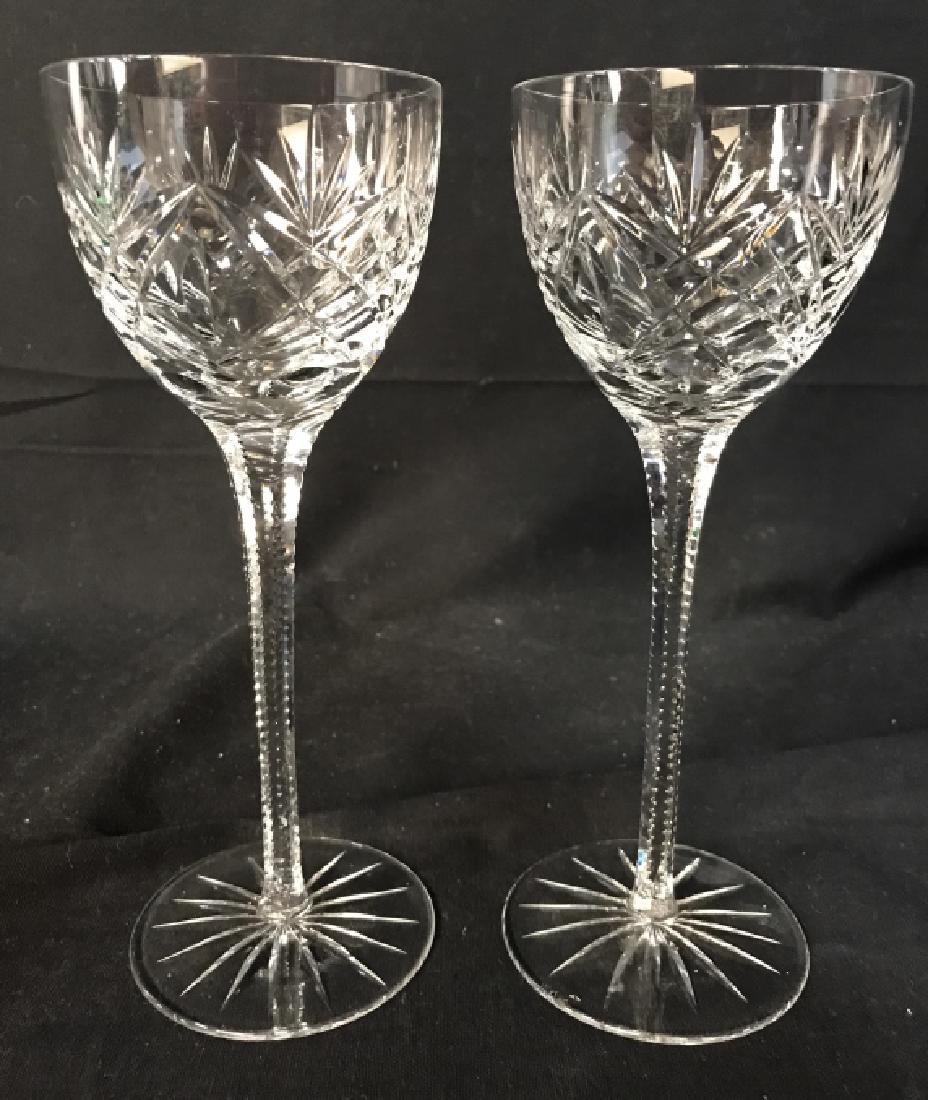 Pair Cut Crystal Stemware: Stemware is Cut Crystal. Stem of each piece is elongated. Measures approx 8 inches tall 3 inches wide. Stemware, wine glasses, barware 6