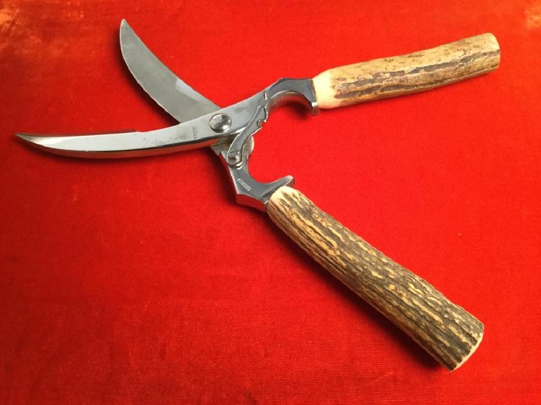 Vintage Rostfrei Poultry Shears W Antler Handles: Vintage Rostfrei Poultry shears with antler handles. Marked on blade for Rostfrei Germany. Shears come in original box. Shears must be handled carefully as locking mechanism needs tightening. Measures