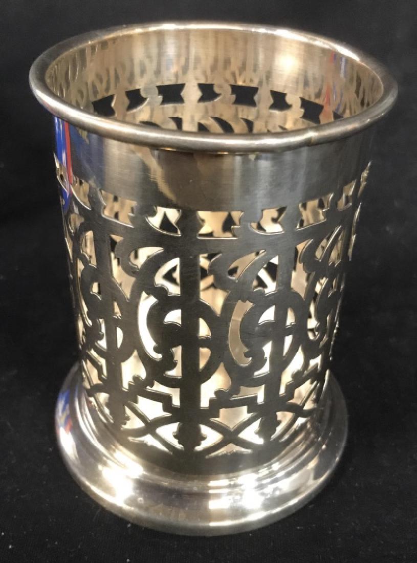 Pierced Silver Plate Coaster Vessel Condiment: Table ware, cylindrical cup holder coaster, measures ht 4.5 inches diameter app 3.5 inches. Marked underside for FB Rogers, Silver on Copper, trademarked, possibly condiment holder, ketchup holder sau