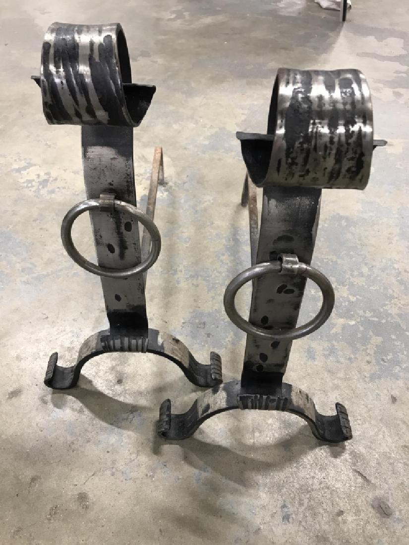 Pair Of Iron Metal Fireplace Andirons: Pair of iron metal fireplace andirons / firedogs / bracket supports. Possibly nickel metal. Each piece measures approx 17.5 inches in height by 9 inches in width by 20 inches in depth. Fireplace Tools