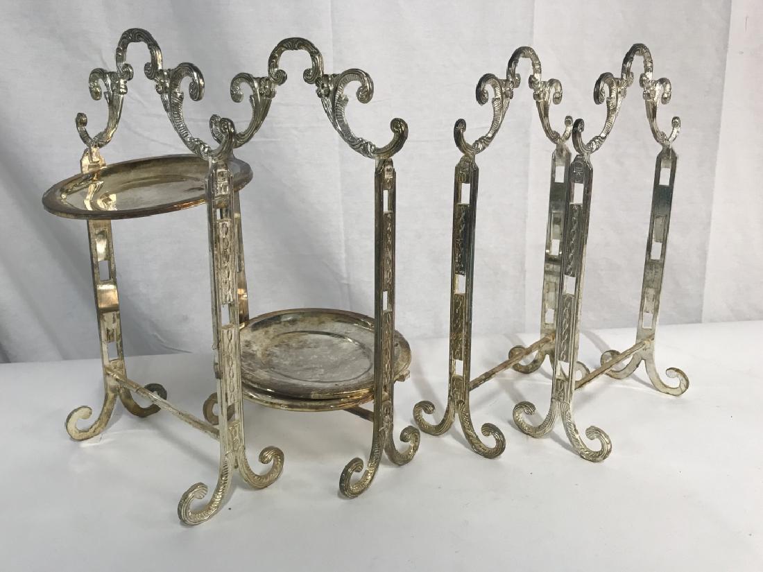 Set 4 Silver Plated Tiered High Tea Serving Trays: Set of 4 silver plated tiered high tea serving trays. Trays have moderate discoloration from metal corrosion. Some trays are detached from stands and multiple are missing. Pieces will need polishing /