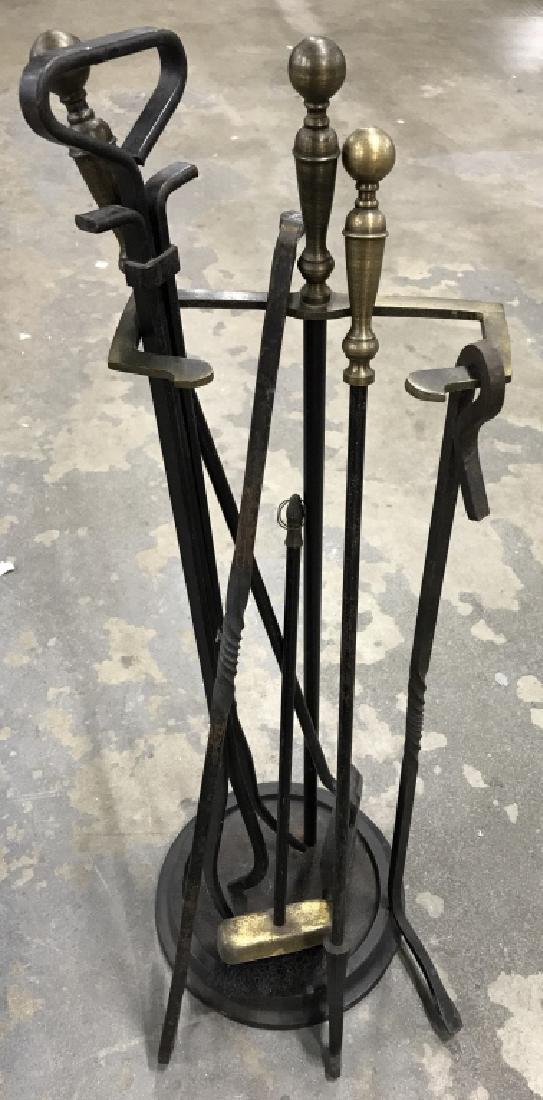 Set of Iron Metal Fireplace Tools W Brass Details: Set of iron metal fireplace Tools with brass details, including a stand with a 3 pokers, shovel, and brush. Iron stand measures approx 28.5 inches in height by 9.5 inches in diameter. Fireplace Tools,