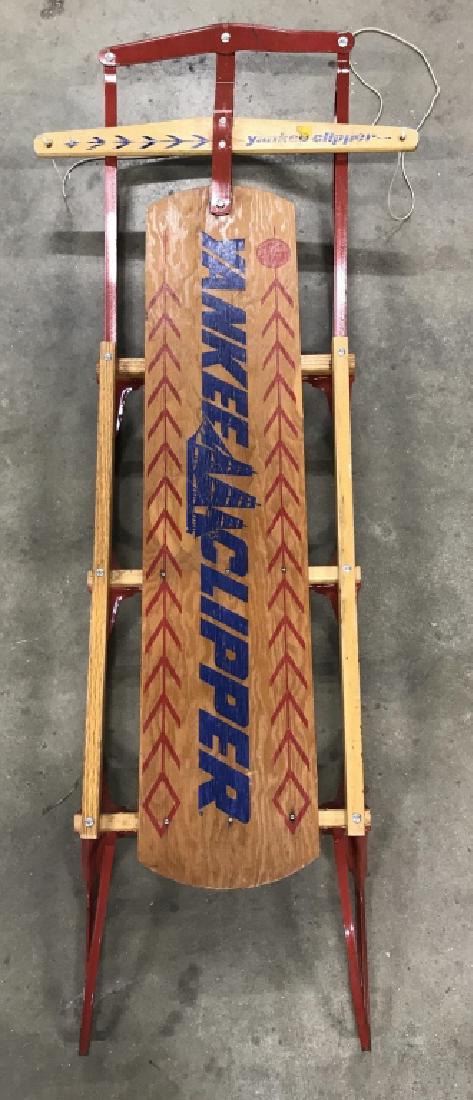 Vintage Yankee Clipper Flexible Flyer Sled: Vintage Yankee Clipper Flexible Flyer Sled, Measures approx 52 inches wide x 21 inches wide x 5.25 inches tall, some wear to metal red toned paint. Vintage Snow Sled, Metal And Wood Vintage Sled, Flex