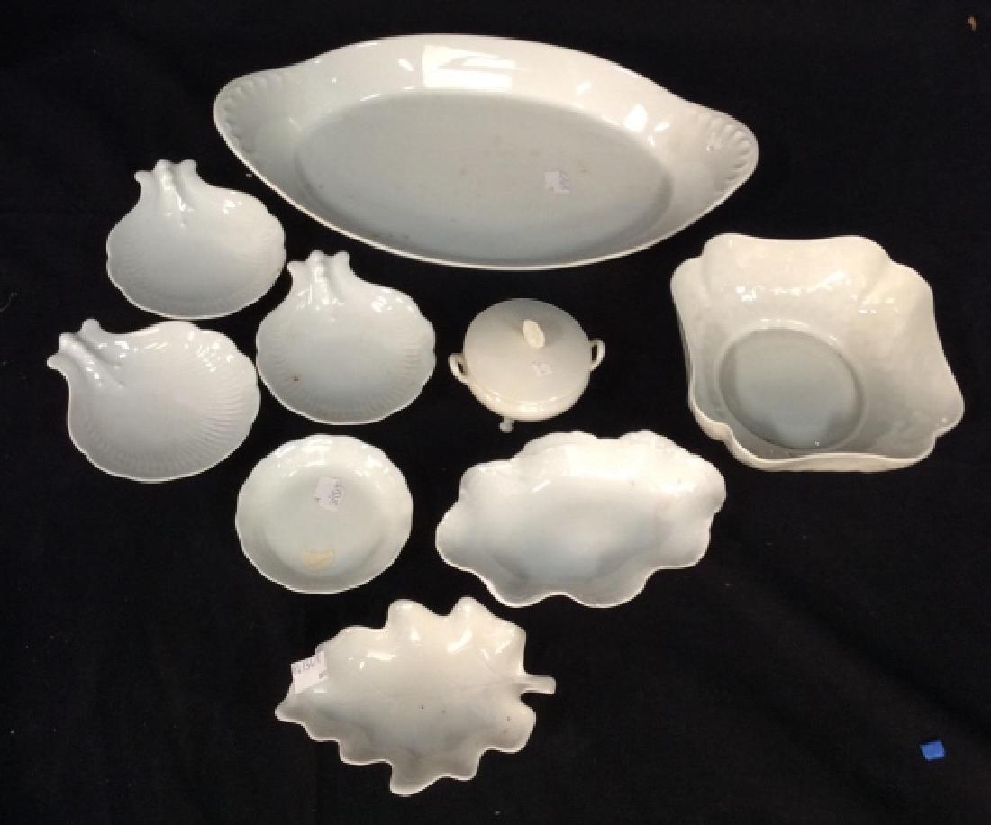 Group Lot White French Porcelain Tableware: Assorted white porcelain, most marked Limoges France, French Porcelain Tableware, largest serving platter measures app 15 inches length ht 2.5 inches, bowls, plates and more