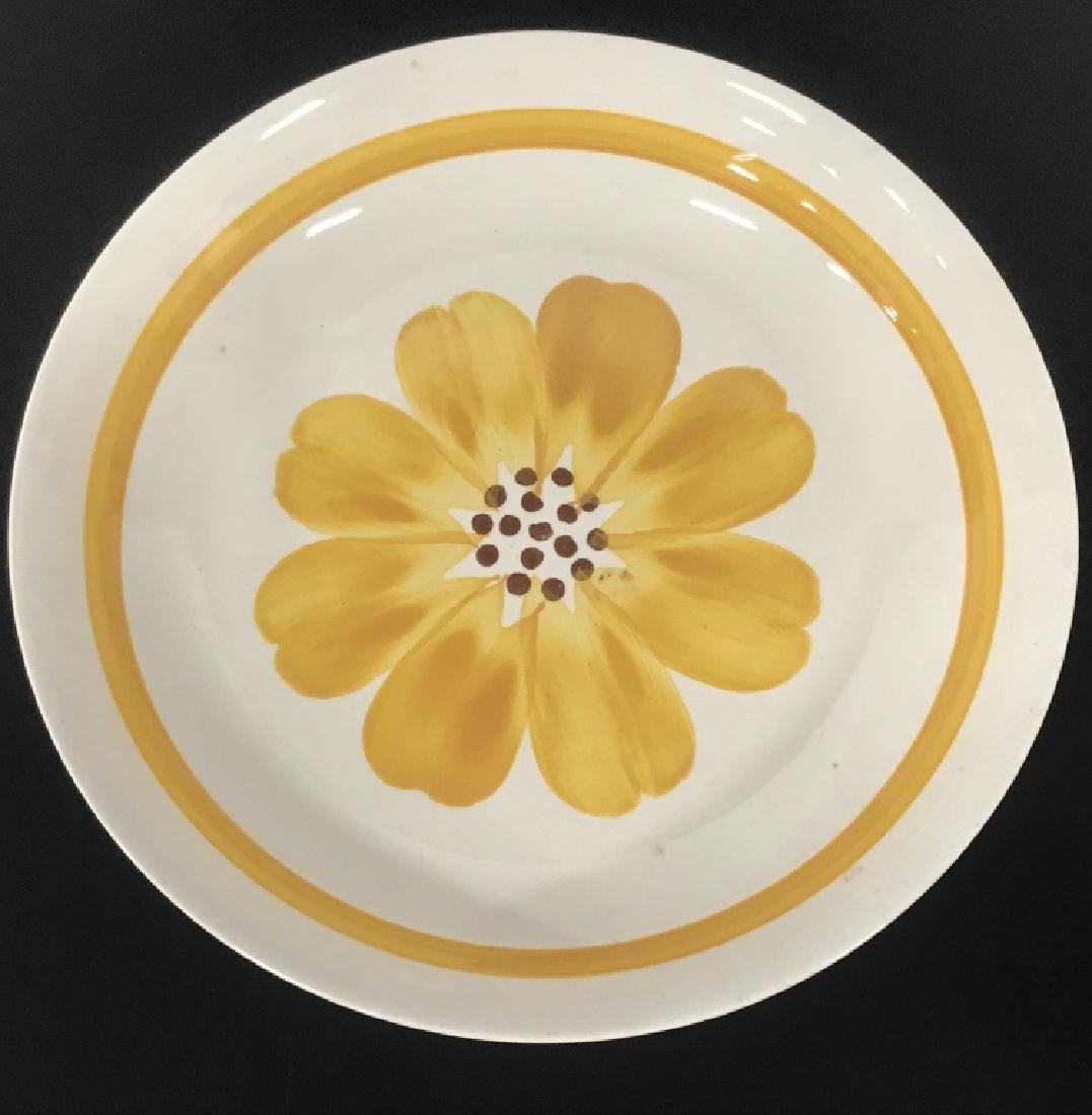 Ironstone Fruit Bowl W Flower Motif: Ironstone fruit bowl with flower motif. Flower is yellow orange in tone. Marked on underside for ironstone, made in Italy. Bowl measures approx 13 inches in diameter by 2.40 inches in height. Decorati