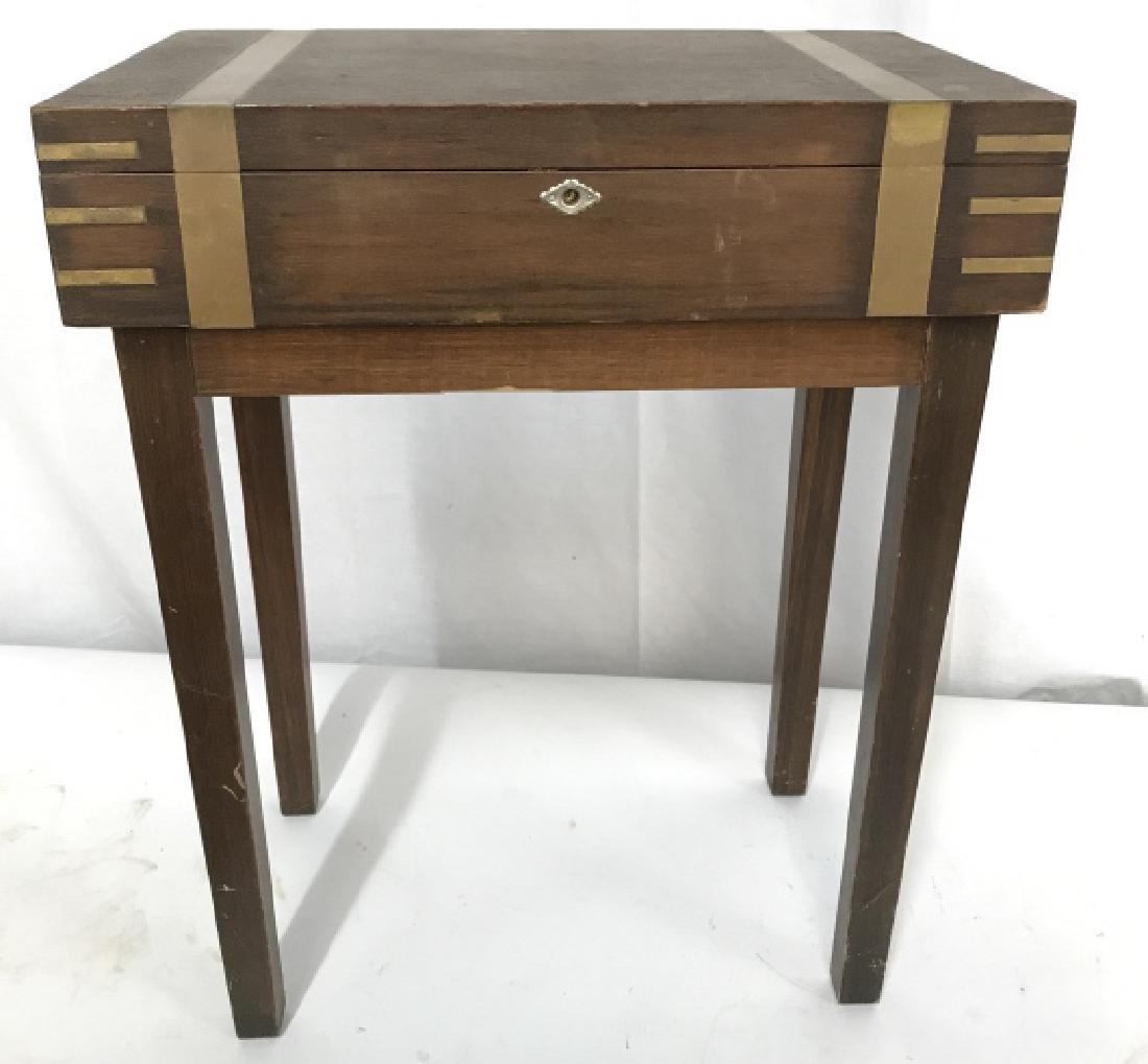 Brass Toned Metal Wooden Box With Stand: Vintage Brass Toned Metal Wooden Box With Stand, interior of box has green fabric lining, measures approximately 20.25 inches tall x 16 inches wide x 10 inches deep, some surface scratches and nicks. 