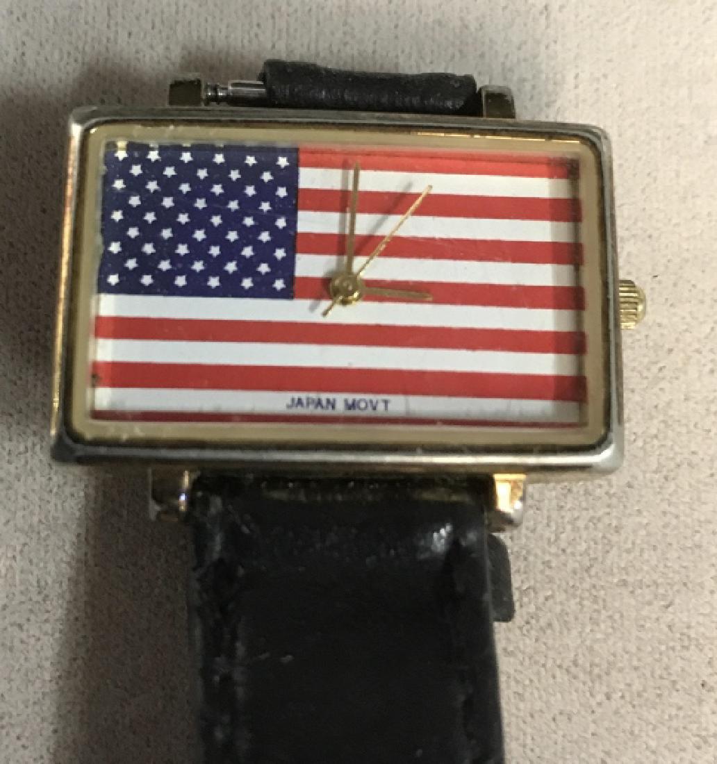 Flagtime Leather and Gold Toned Flag Watch: Flagtime wristwatch, case measures 11/4 x 3/4 in, leather band, warm condition, face as American flag, Japan Movement, Watches, Wrist Watch, time piece, jewelry, patriotism, American Flag, fashion acc