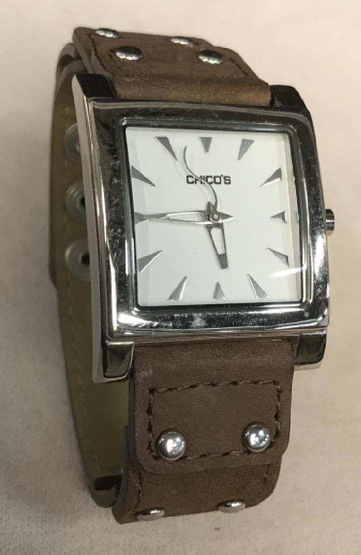 Chico’s Leather Wristwatch: Chico’s Leather Wristwatch, case measures 1 in square, good condition, not tested, Face marked Chico’s, back Stainless steel back, Japanese Movement, brown suede snap closure band, Watch, Chico’