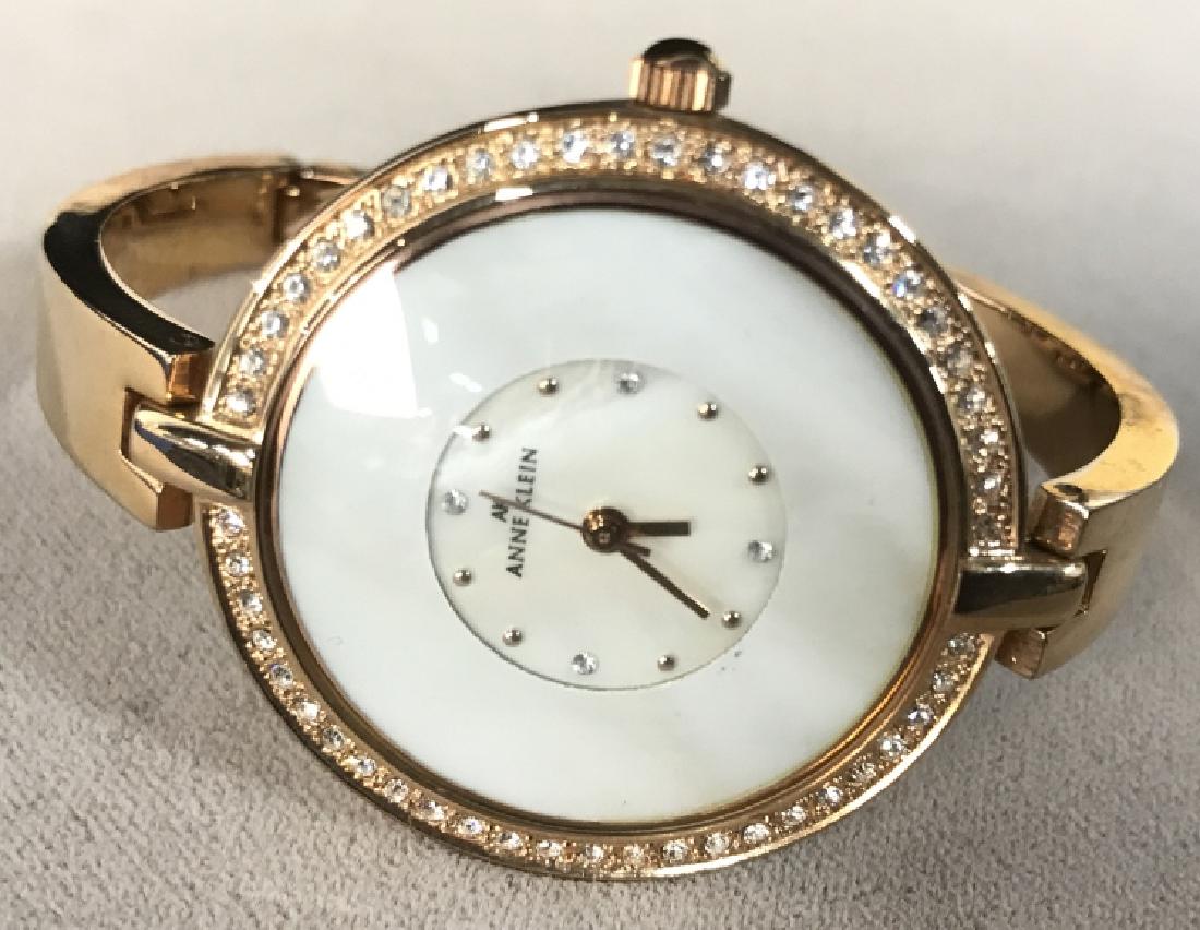 Anne Klein Gold Toned Bracelet Wristwatch: Anne Klein Gold Toned Bracelet Wristwatch, case. 15/8 in diameter, band rid, 3 in diameter, adjustable, not tested, but face and bracelet in good condition, Jewelry, wristwatches, Watch, Gold Toned, A