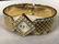 CENERE Gold Toned and Rhinestone Bangle Watch