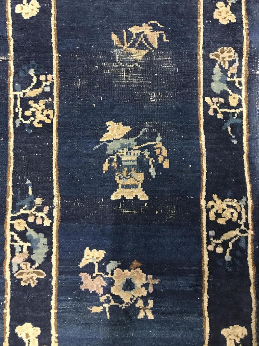 Antique Chinese Art Deco Handmade Wool Rug: Rug is handmade and wool. Contains multi toned floral & leaf detail, with tones of tan, brown, blue, lavender. Measures approx 44 inches long 24 inches wide. Contains evident wear & tear & missing edg