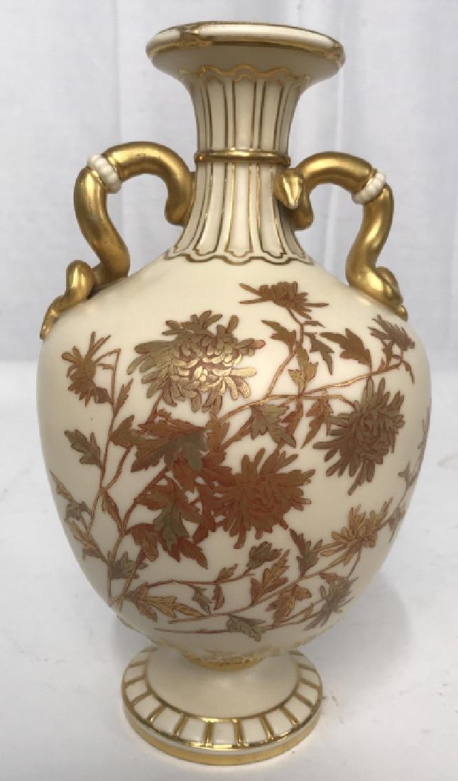 Antique Royal Worcester Porcelain Vase: Possibly 19th century, jug handled vase with gold accented snake form handles, hand painted gold and crimson florals, trademarked and numbered underside, no condition issues noted, ht app 9.5 inches w