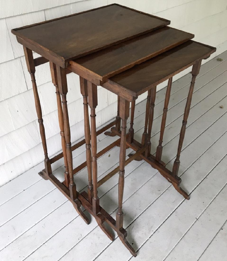 Antique English Regency Mahogany Nesting Tables: Set of three antique English Regency Mahogany Nesting Tables, French Polish to surface sheen, Each with turned legs, largest measures 29 inches by 18.5 inches by 11 inches, Property of Westport Waterf