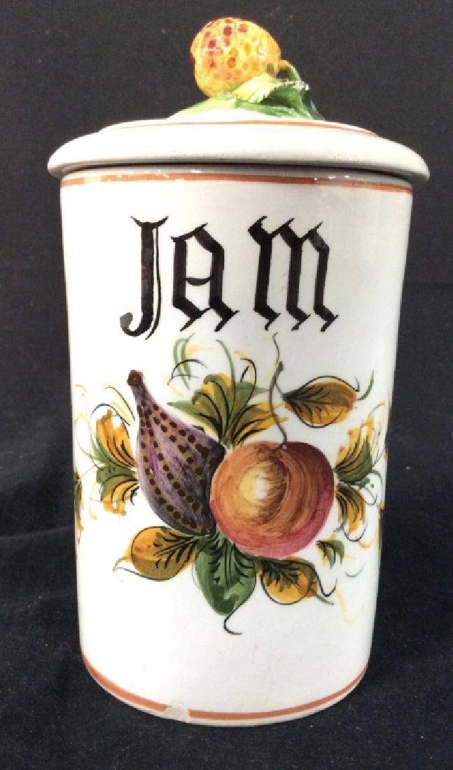 Lidded Porcelain Jam Jar: Underside reads ITALY. Jar is Lidded, reads JAM on front side. Measures approx 7 inches tall 4 inches wide. Has some minor chips. tableware, tabletop accessory, kitchen accessory 6