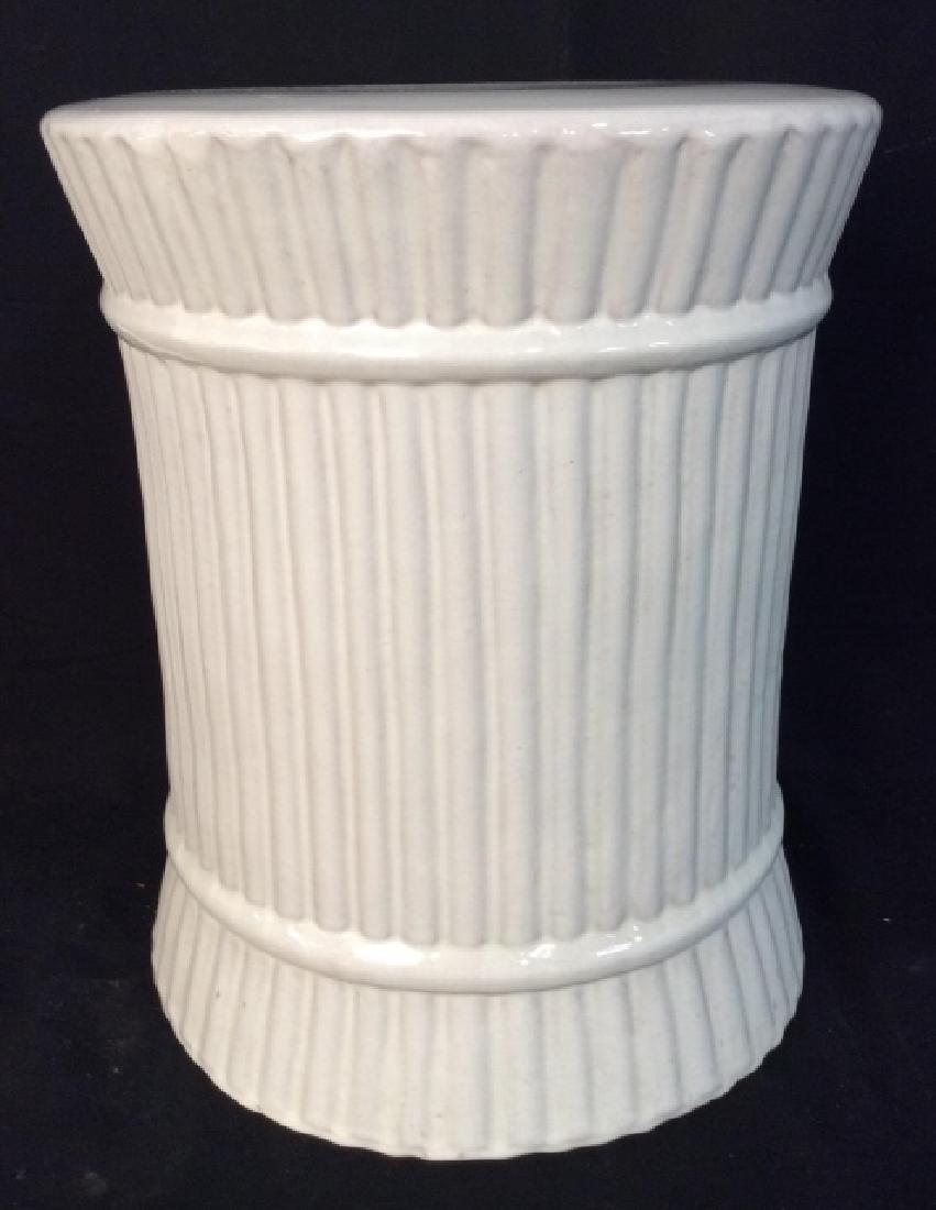 White Ceramic Side Table Stool: White Ceramic Side Table Stool With vertical line design, crazing to ceramic seems intentional, measures approx 18 inches tall x 15 inches in diameter. Ceramic Stool, Ceramic Side Table, Ceramic Pedes