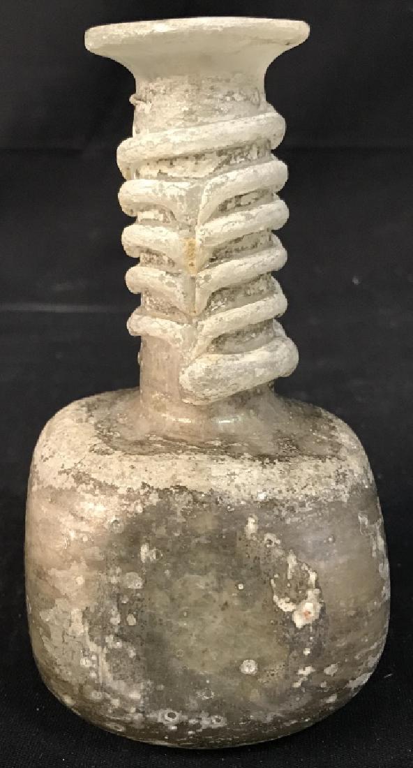 Antique Style Glass Bottle: Antique Style Glass Bottle, 6 in x 3 in, rolled neck, no marks, bottle has rough spots on exterior, like scale, antique style bottle, Tableware, Collectible Bottles, kitchenware, Roman Style Glassware