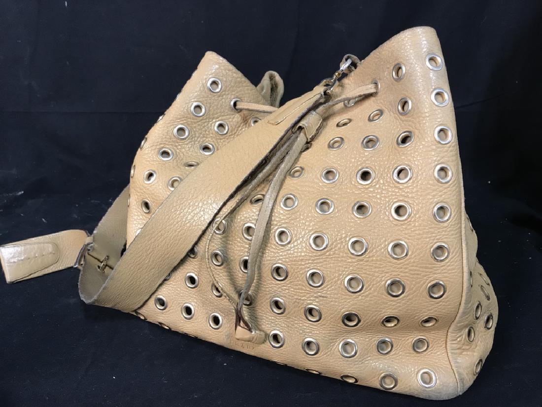 Vintage Camel Toned Prada Shoulder Bag: Vintage Camel Toned Prada Shoulder Bag, brass rivet holes, with leather draw string closure, 12 in x 5 in deep, x 10 in tall, visible wear to interior, ink marks, wear to bottom seams, Prada, Prada Vi