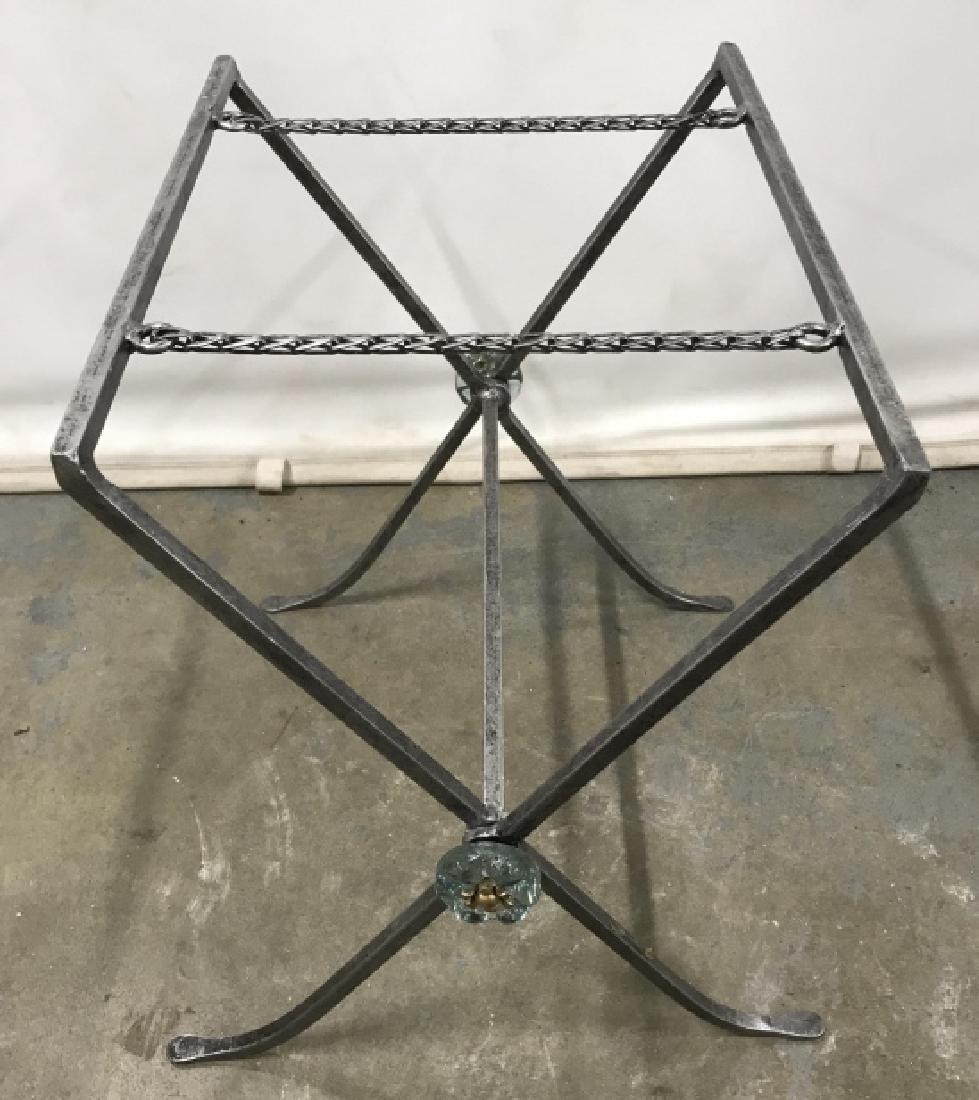 Metal Folding Suitcase Luggage Rack: Metal folding suitcase luggage rack. Rack is brushed silver in tone with chain straps and translucent blue tone flower finials, possibly plastic. Rack measures approx 19 inches in height by 16 inches 