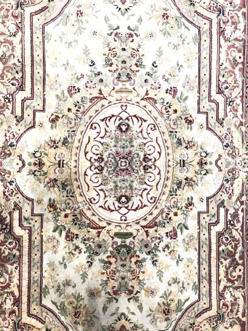 Handmade Oriental Fringed Wool Rug: Rug is handmade and wool. Contains intricate floral leaf and vine detail with tones of cream, red, green, & coral. Contains fringes. Measures approx 97 inches long 54 inches wide. Handmade rug, area r