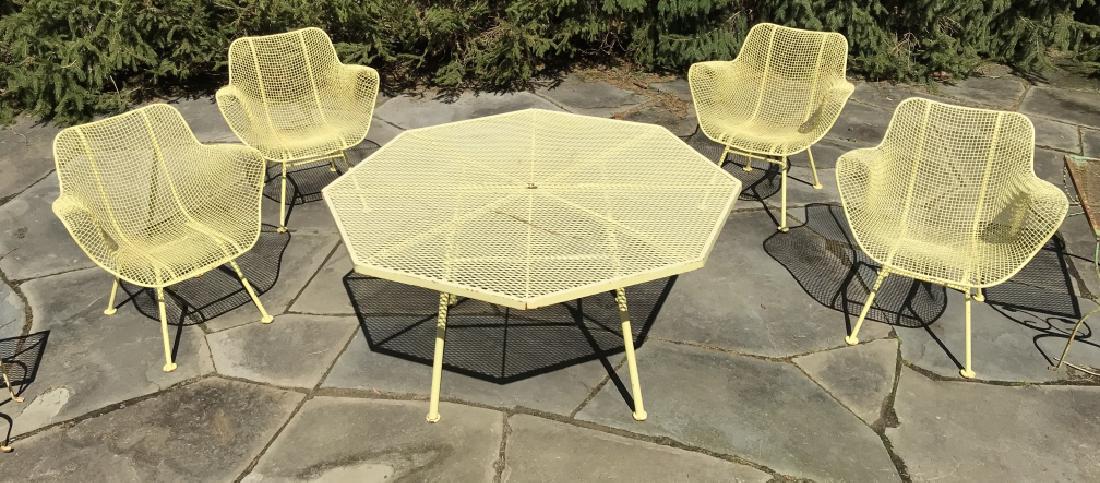 Set 8 Russell Woodard Sculptura MCM Patio: Set 8 Vintage Mid Century Modern Russell Woodard Sculptura Iron Four Arm Chairs, Octagonal Dining Table, And three smaller side tables. Octagonal Russell Woodard dining table with four woven wire scul