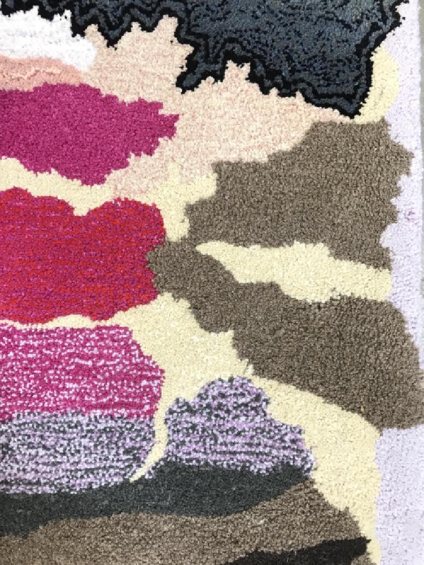 Signed Wool Pile Carpet W Scene Depiction: Carpet appears to Possibly be signed with initials. Contains tones of magenta, black, lavender, red, brown, light brown. & white. Measures approx 97 inches long 51 inches wide. Has some color fading. 
