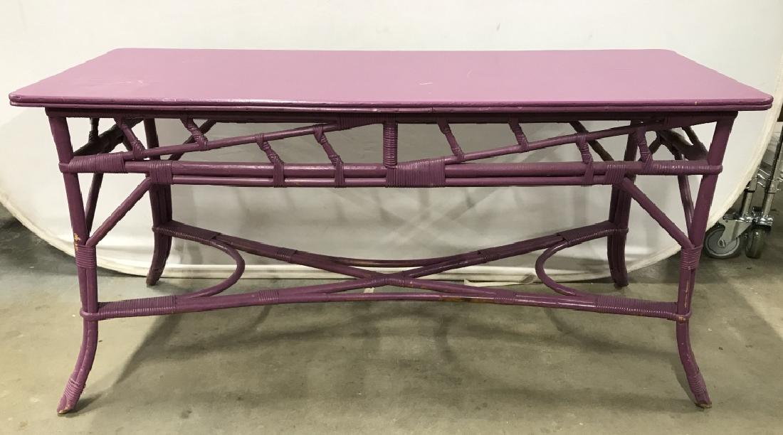 Purple Toned Faux Bamboo Console Table: Purple toned painted wooden & faux bamboo, Rattan console table. Can be repurposed as Desk. Console table, desk, purple table, side table ,wooden table. Measures approx 55 inches long 27 inches tall 2