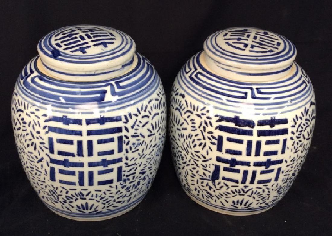 Pair Signed Ceramic Chinese Ginger Jars: Vintage possibly antique, blue and white patterned glazed Chinese Ginger Jars, each with lid, Asian decorative arts, Asians Tableware, Vases, Vessels, urns, each measures ht app 10 inches, diameter ap