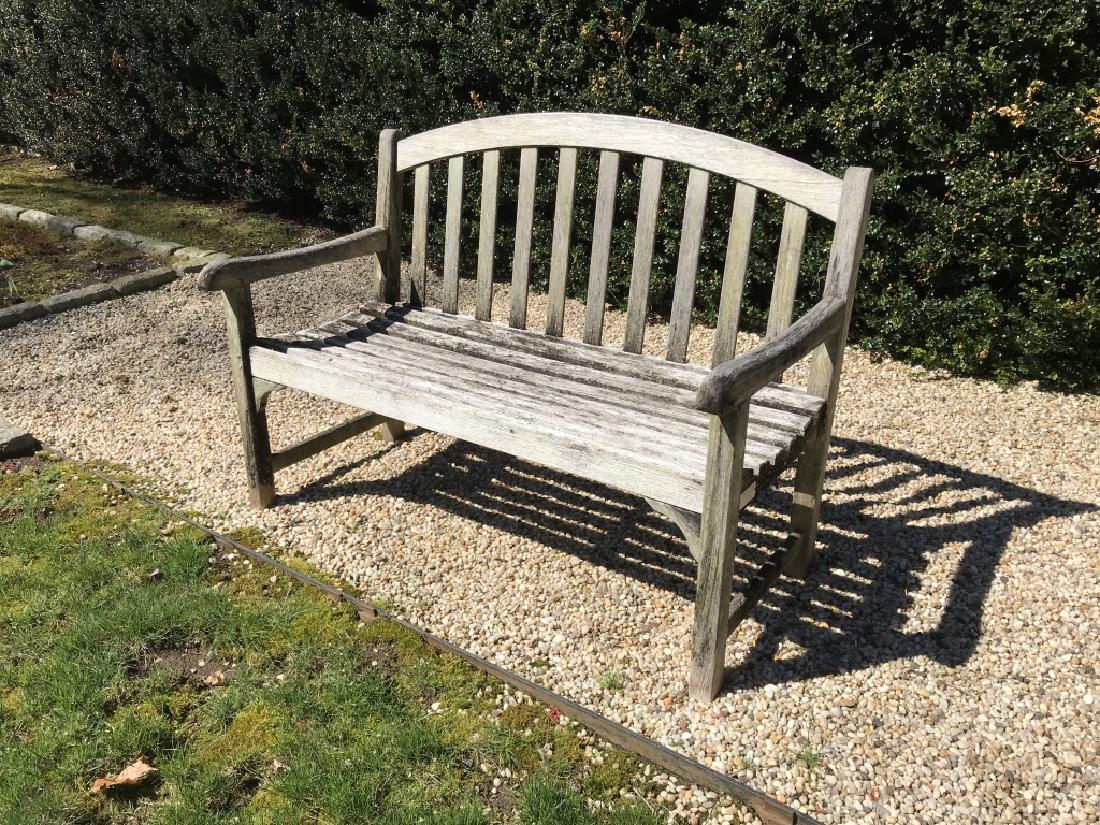 Teak Wood Gray toned Garden Bench: 36 in by 47 In 19 in. Teak wood weathered to gray tone, garden bench, out door furniture, seating, bench, garden accessory. label for country casual, Property of Bedford New York Estate