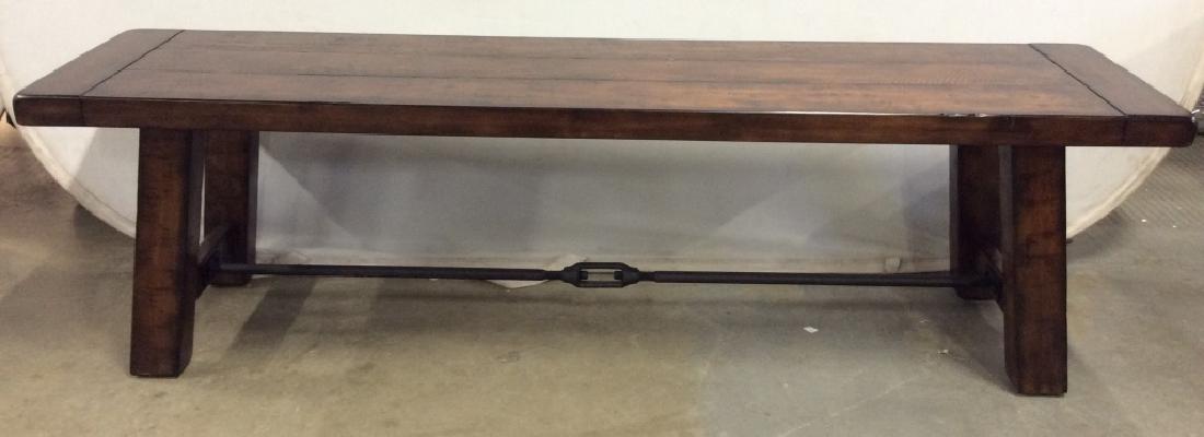 Brown Toned Wooden Bench: Bench is brown toned and wooden. Tag on underside reads POTTERY BARN. MEASURES approx 64 inches long 18 inches deep 16 inches tall. Home furnishings, bench, seating, home accessory 6