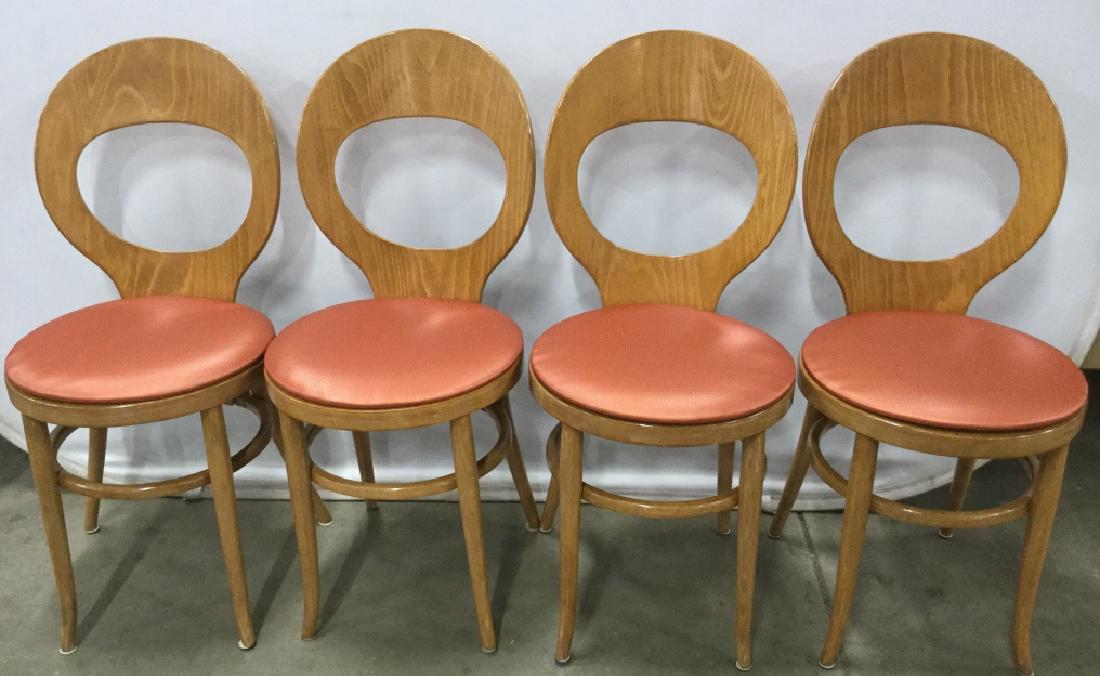 Set 4 Mid Century Modern Style Wood Dining Chairs: Set of 4 Mid-century modern Bentwood style, BIEDERMEIER style, side dining chairs. Chairs are medium tone wood with circle style backs. Chairs have Indented Pointillist Dots On Orange pink, spiced cor