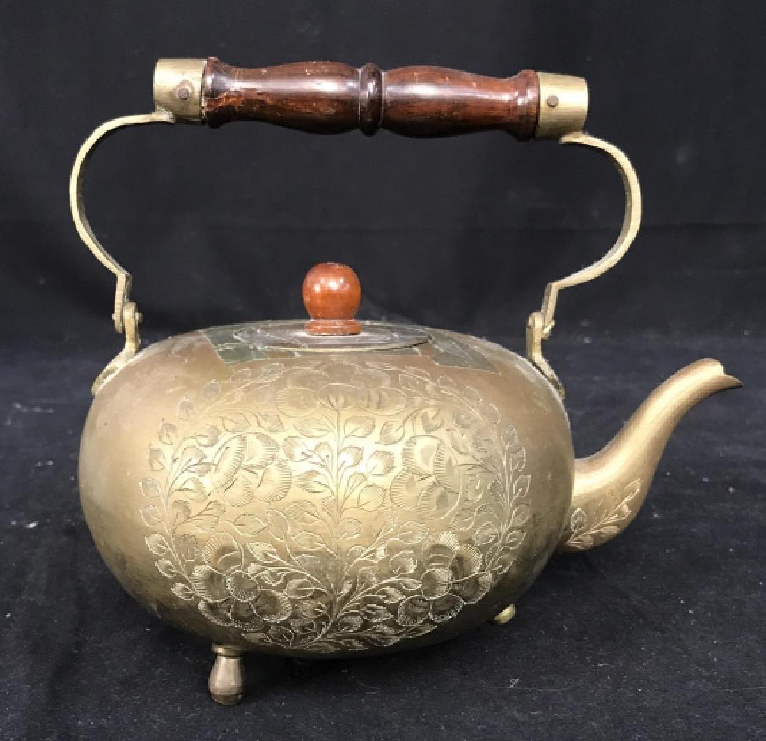 Asian Brass Copper Wood Teapot, India: Footed etched. Gold toned tea pot with wood handle wood finial, Asian arts and crafts, tableware, tea pot, tea service marked for India, measures ht 7.5 inches spout to rim app 8.5 inches