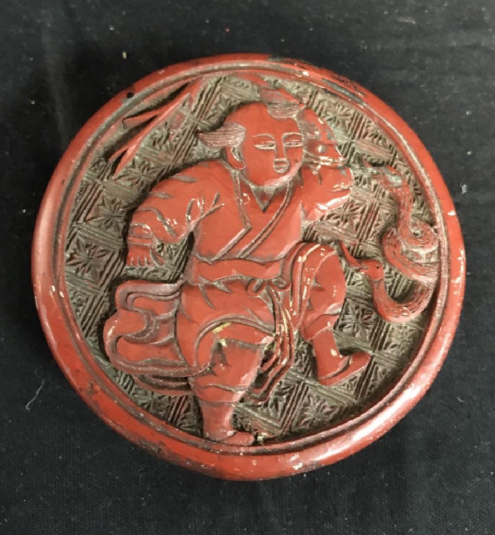 Antique Chinese Carved and Lacquered Jewelry Box: With Buddha carved in relief, Lidded red trinket box, jewelry box, chinoiserie, Chinese decorative arts, Chinese antique arts and crafts, measures ht app 1.5 inches diameter app 3 inches