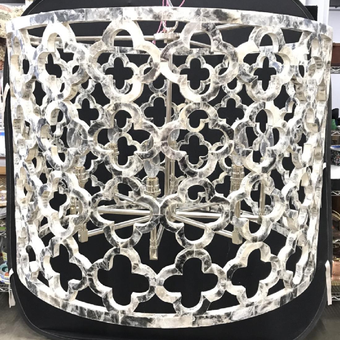 IRONIES ASILAH Chandelier: Piece contains bone & black tones. Contemporary, transitional style. Lattice 8 light pendant style chandelier. Style no. 560. Designer furniture, Ironies chandelier, lattice chandelier. Piece has poli