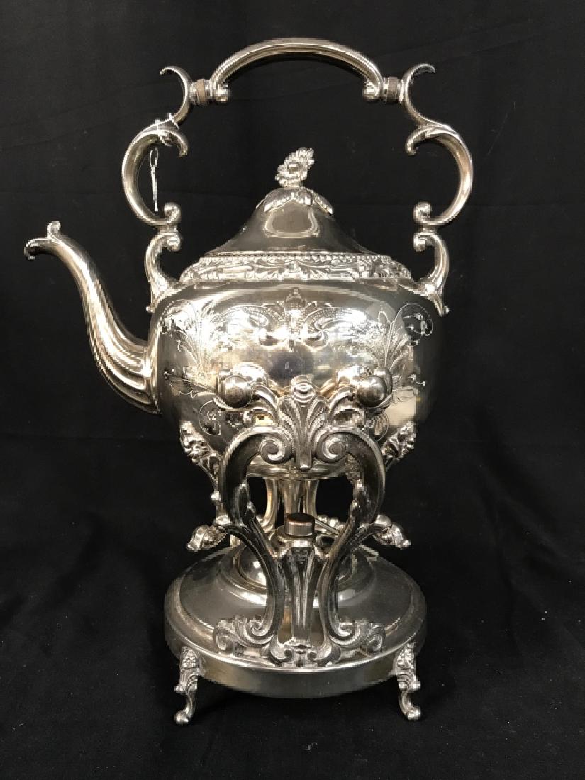 Silver-plated Floral Swag Tea Service Set W Tray: Silver plated tea and coffee service set with tray. Hallmarks suggest set was made by Goldfeder Silverware Co. set has floral swag details. Set includes 3 tea pots, 2 sugar pots, 1 cream pitcher, 1 bu