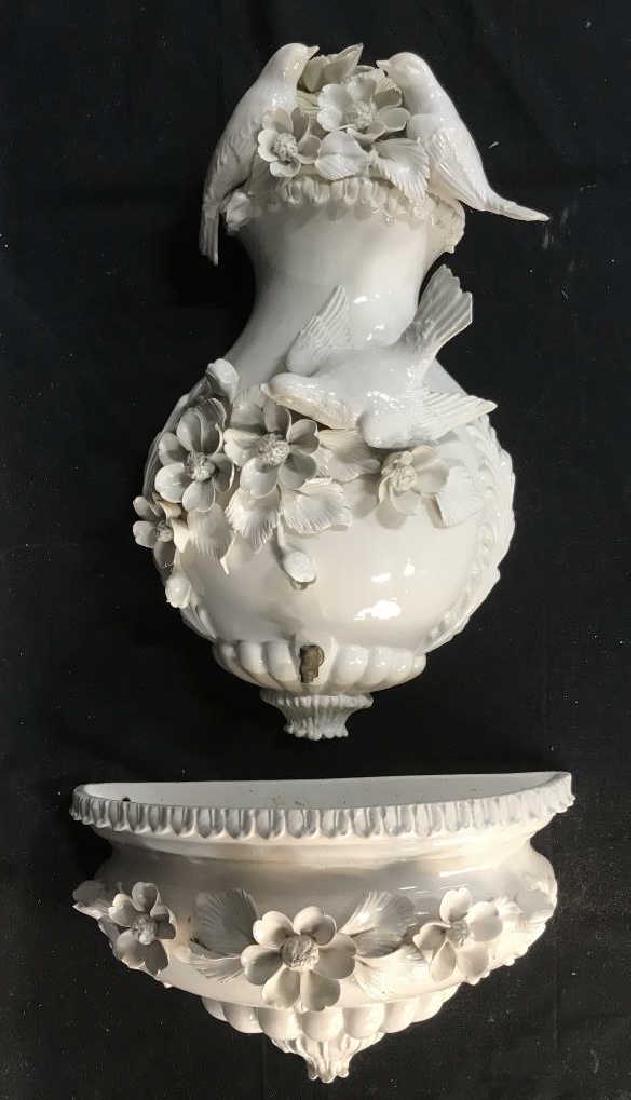 Capodimonte Style Floral Porcelain Water Fountain: Capodimonte style floral porcelain wall hanging water fountain, water basin / planter. Lot includes fountain and basin. Pieces are white in tone with Capodimonte style porcelain flowers and birds. Ver