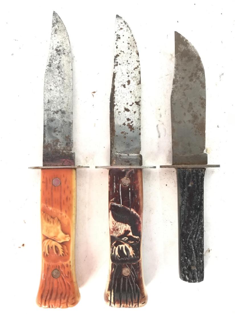 Lot 3 Vintage Carved Handle Knives: Handles appear to possibly be carved bone, possibly Bakelite. Contains carved depictions of moose’s. Pieces are vintage. Largest knife measures approx 9 inches long. Weaponry, knife, hunting knife, 