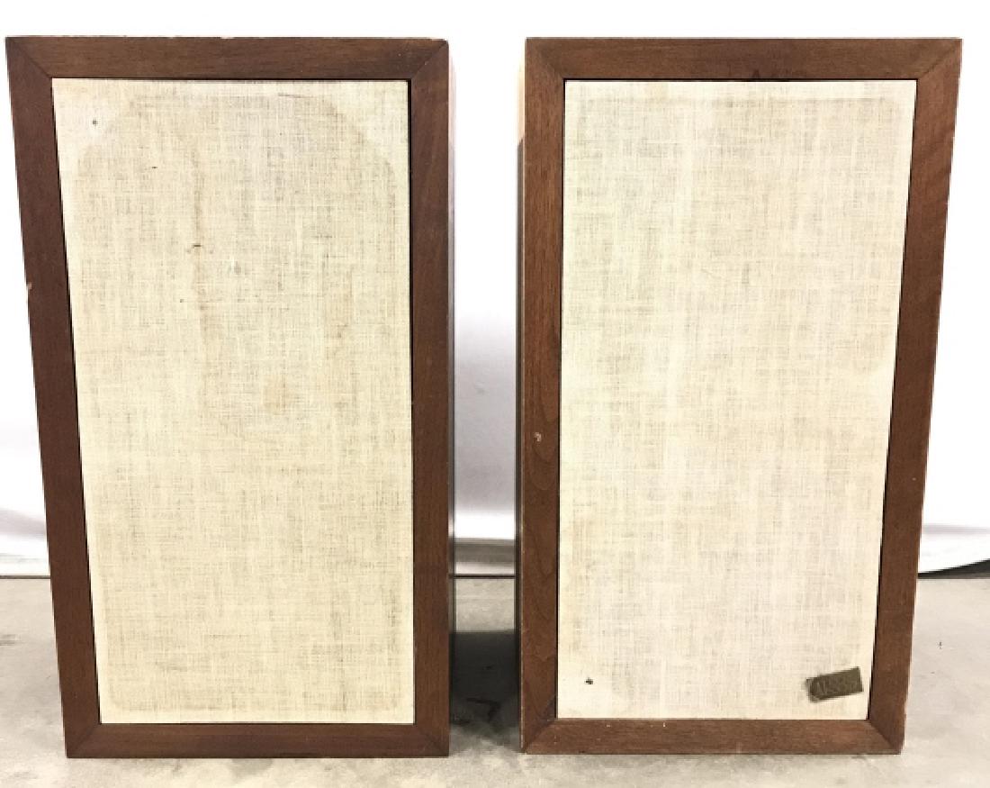 Pair Vintage AR3A Wooden Speakers: Tag on lower right corner of one speaker reads AR3A. Pieces are wooden, fronts of pieces are cream toned. Each measures approx 25 inches tall 14 inches wide 12 inches deep. Each have evident wear, scr
