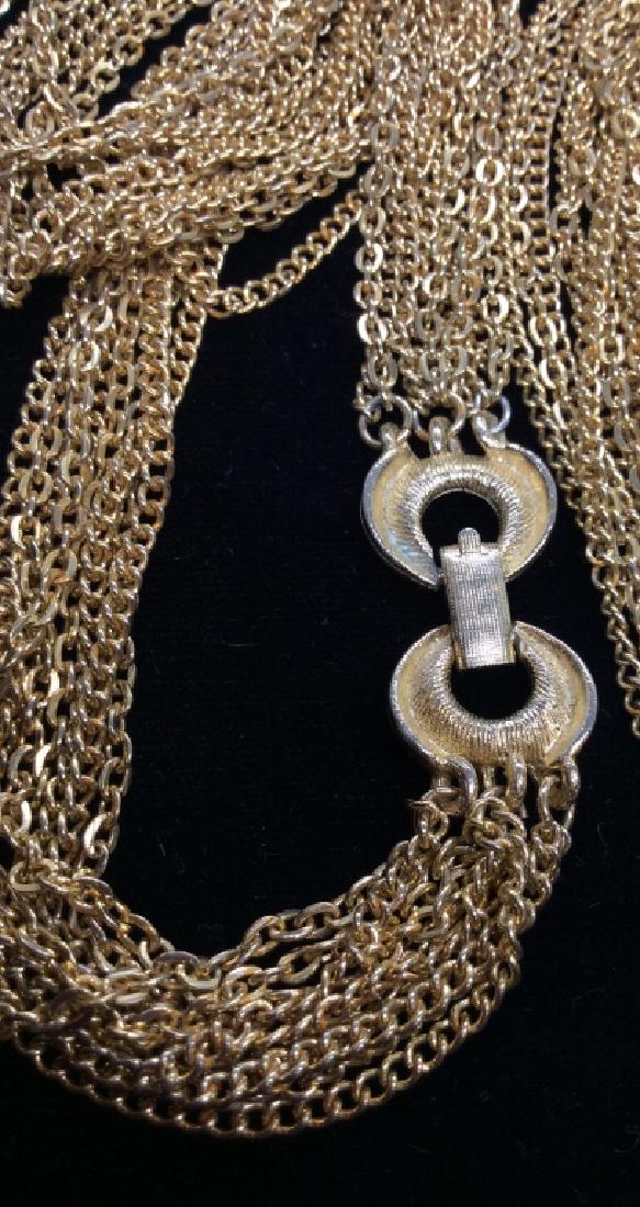 Multi Stand Gold Toned Necklace: Multi stranded gold toned chain necklace Measures app 19 in long. Women’s vintage estate jewelry, statement necklace, fashion accessory, wearable accessories. 4