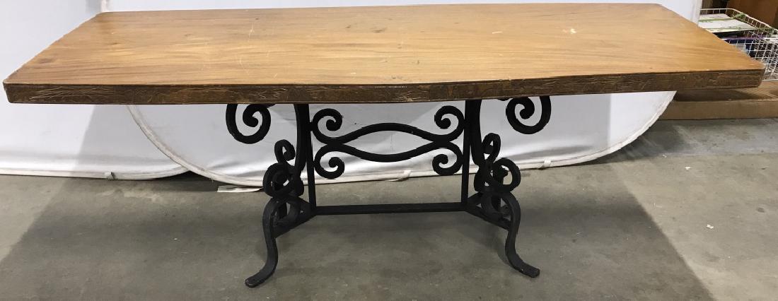 Vintage Wood Top Iron Base Table: Dinner table, home furnishings, home accessory Measures approx 72 inches long 28 inches tall, 29 inches deep.