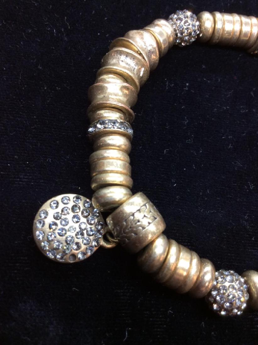 Brass Toned Metal Bead Bracelet: Brass toned metal beads with rhinestone details stretch bracelet, measures app 3 in diameter . Some missing rhinestones Women’s vintage estate jewelry, statement jewelry, vintage costume jewelry fas