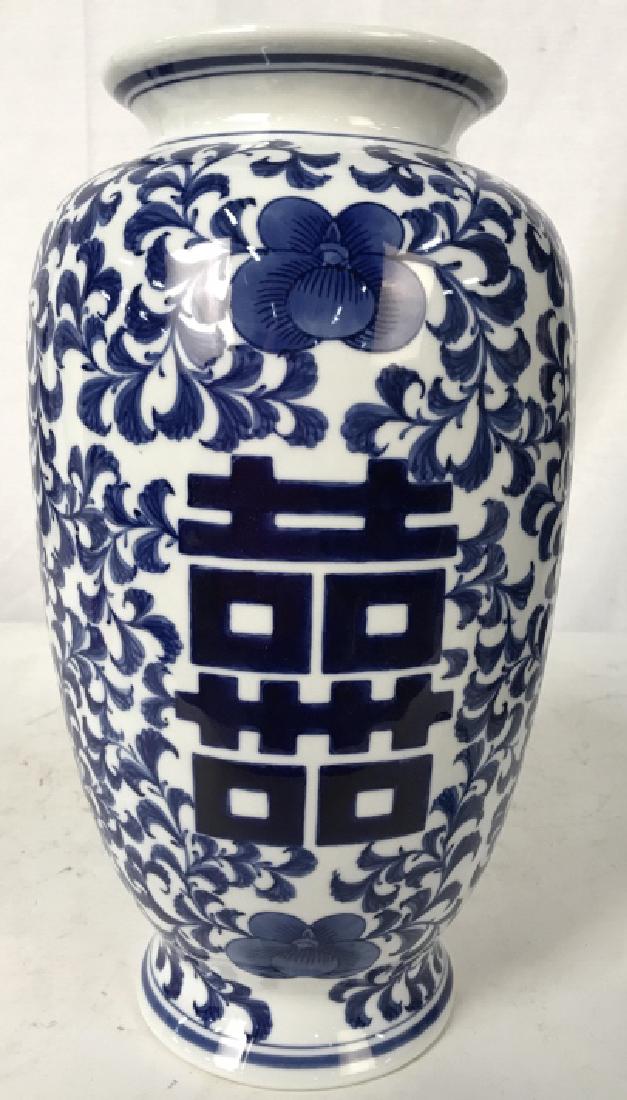 Blue White Asian Porcelain Vase: Marked underside for Bombay and Company, porcelain vase, table ware, Asian decorative arts measures ht 14 inches diameter app 8 inches