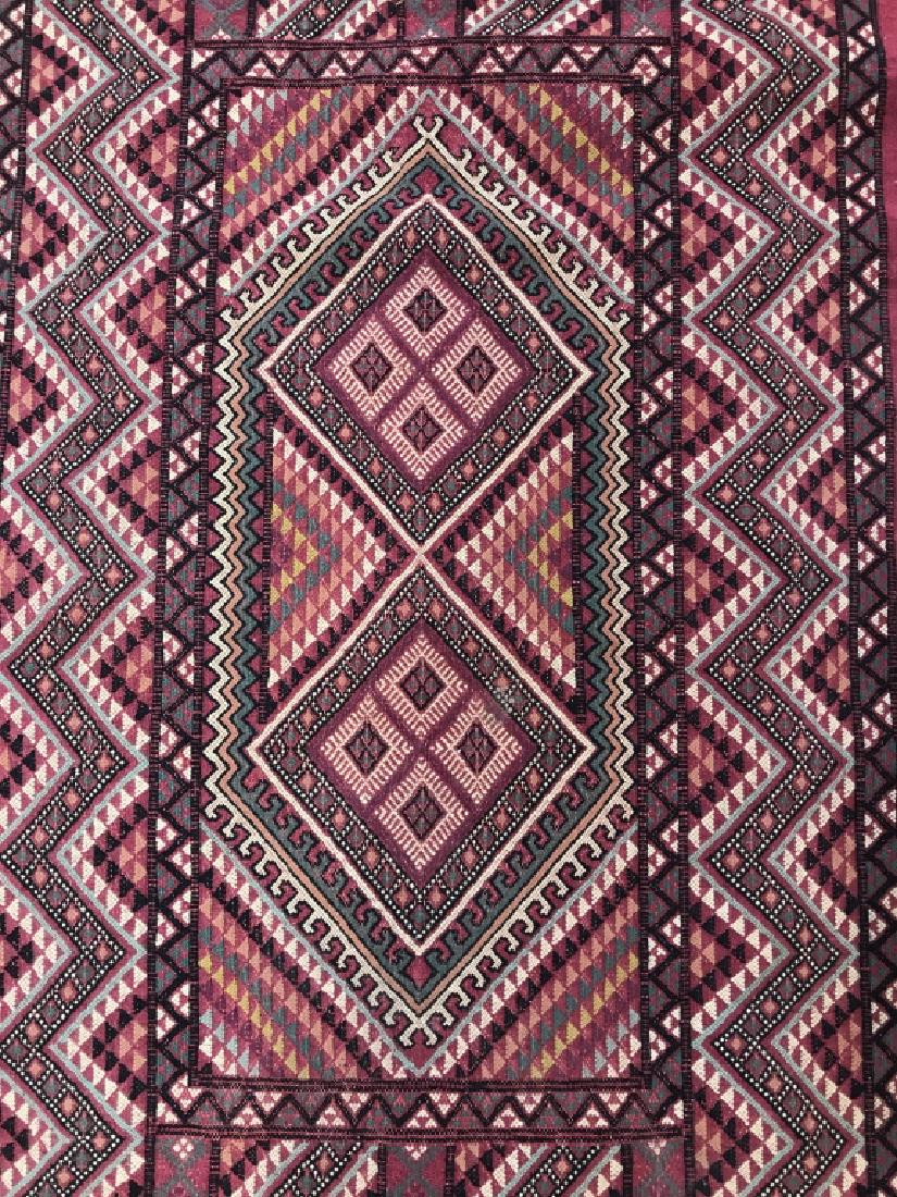 Hand Made Wool Carpet W Geometric Design: Hand Made Wool Carpet W Geometric Design In red, black green and cream tones, measures approximately 64 inches long x 33 inches wide, some fraying to one edge. Wool Carpets, Hand Made Area Rug, Hand M