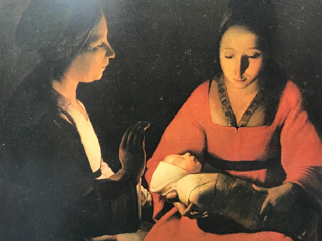 Framed Print of Georges de La Tour’s Newborn Child: Framed print of Georges de la Tour’s The Newborn Child, depicting two women with a baby. Print is under matte glass, and has not been inspected outside of frame. Artwork is matted and set in wood fr